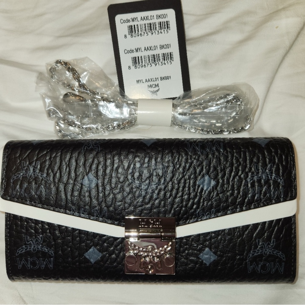 Beautiful Authentic BRAND NEW MCM CROSSBODY..New in box…Dust Bag included